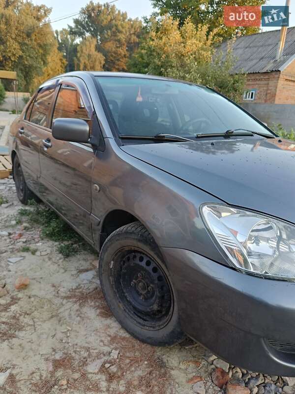 Седан Mitsubishi Lancer 2008 в Ромнах