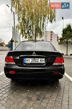Седан Mitsubishi Lancer 2005 в  фото 12 Седан Mitsubishi Lancer 2005 в
