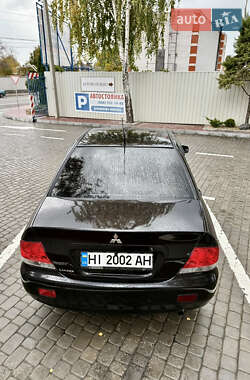 Седан Mitsubishi Lancer 2005 в  фото 44 Седан Mitsubishi Lancer 2005 в