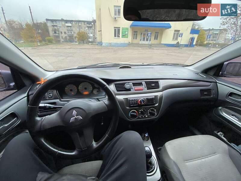 Седан Mitsubishi Lancer 2007 в Каменском фото 9 Седан Mitsubishi Lancer 2007 в Каменском
