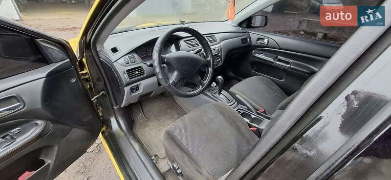 Седан Mitsubishi Lancer 2004 в Кам'янському фото 10 Седан Mitsubishi Lancer 2004 в Кам'янському