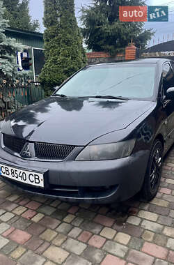 Седан Mitsubishi Lancer 2006 в Мене