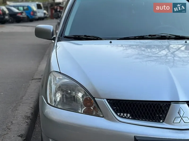 Mitsubishi Lancer 2009 VIN JMBSRCS3A9U000352 фото оголошення 3 з 41