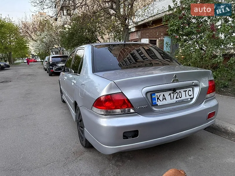 Mitsubishi Lancer 2009 VIN JMBSRCS3A9U000352 фото оголошення 4 з 41