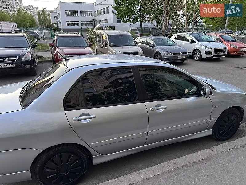 Mitsubishi Lancer 2009 VIN JMBSRCS3A9U000352 фото оголошення 7 з 41