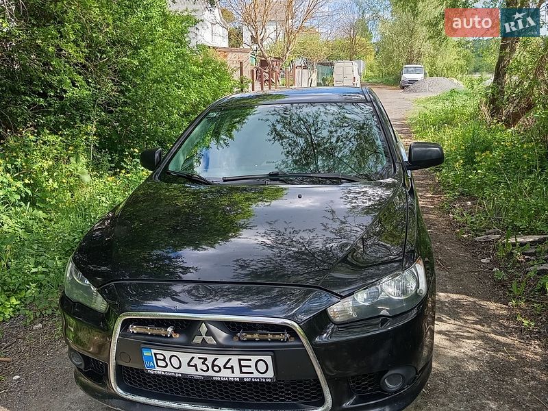 2012 Mitsubishi Lancer, VIN JMBSRCY1ACU001943:plate — фото 1 (autoria)