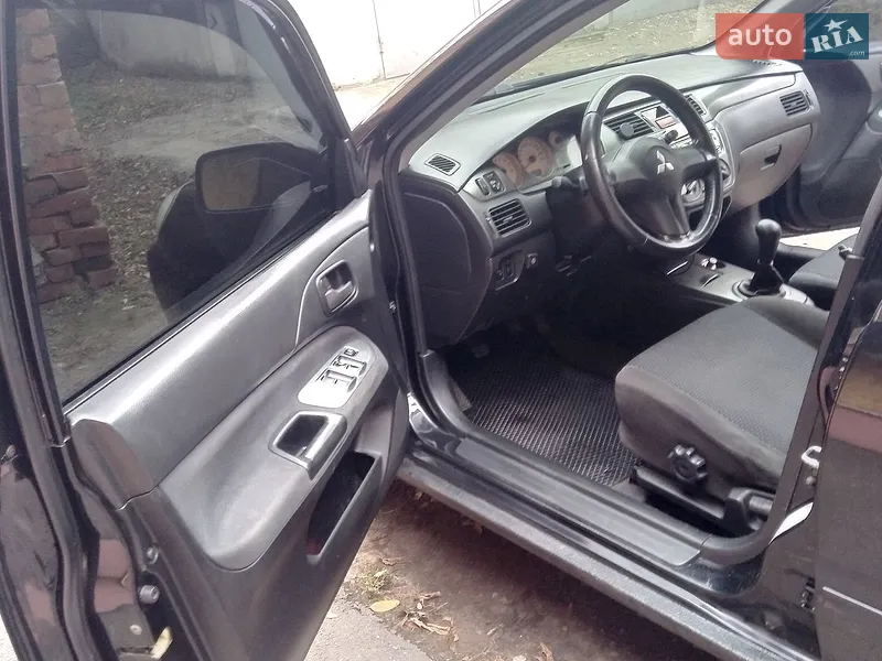 Mitsubishi Lancer 2006 VIN JMBSNCS3A6U028789 фото оголошення 9 з 52