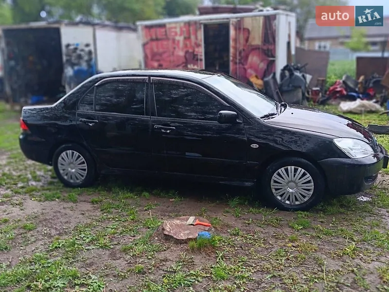 Mitsubishi Lancer 2008 VIN JMBSNCS3A8U004735 фото оголошення 3 з 37