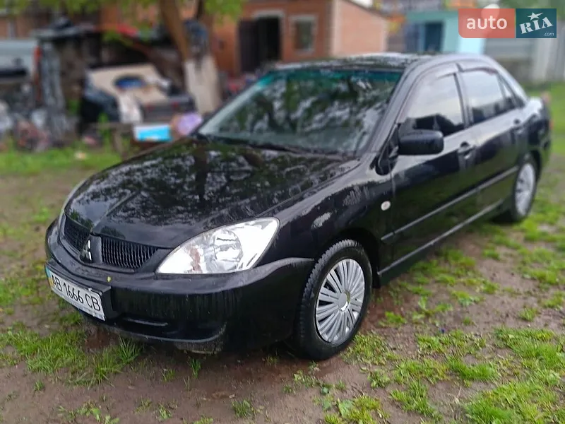 Mitsubishi Lancer 2008 VIN JMBSNCS3A8U004735 фото оголошення 2 з 37