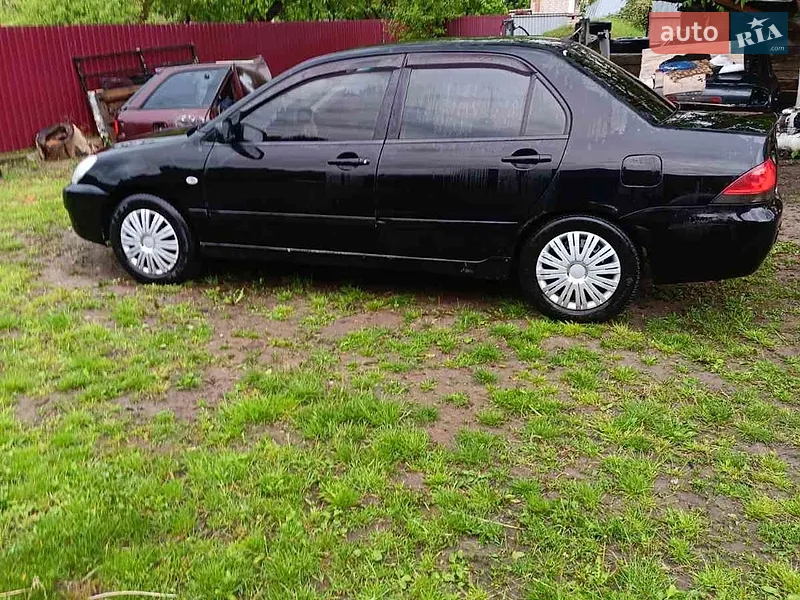 Mitsubishi Lancer 2008 VIN JMBSNCS3A8U004735 фото оголошення 4 з 37
