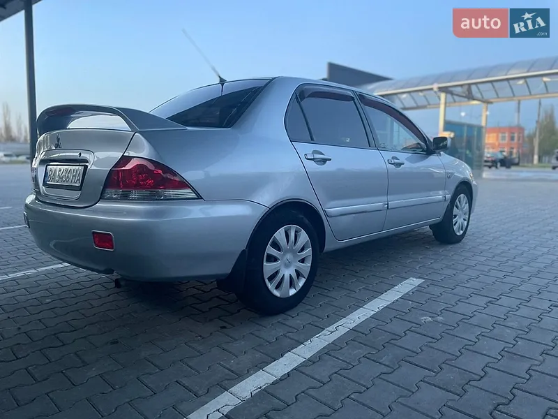 Mitsubishi Lancer 2008 VIN JMBSRCS3A8U007457 фото оголошення 9 з 58