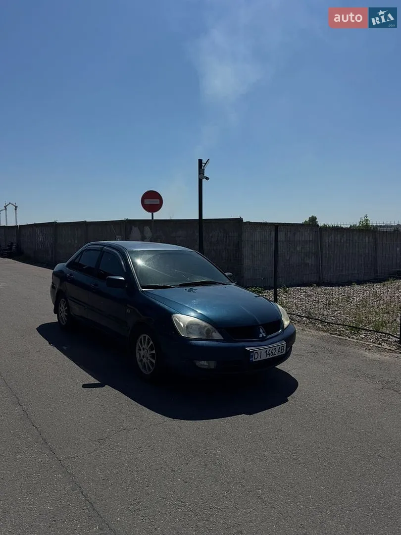 Mitsubishi Lancer 2011 VIN JMBSRCY2ABU009193 фото оголошення 9 з 20