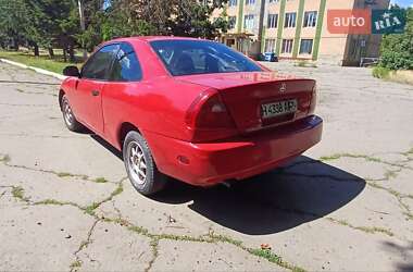 Хэтчбек Mitsubishi Mirage 2002 в 