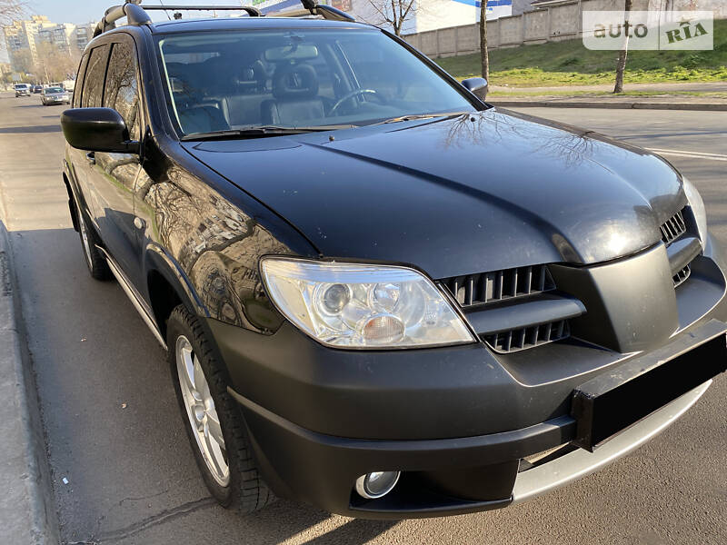 Позашляховик / Кросовер Mitsubishi Outlander Sport 2009 в 