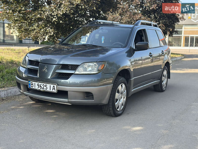 Внедорожник / Кроссовер Mitsubishi Outlander 2003 в 