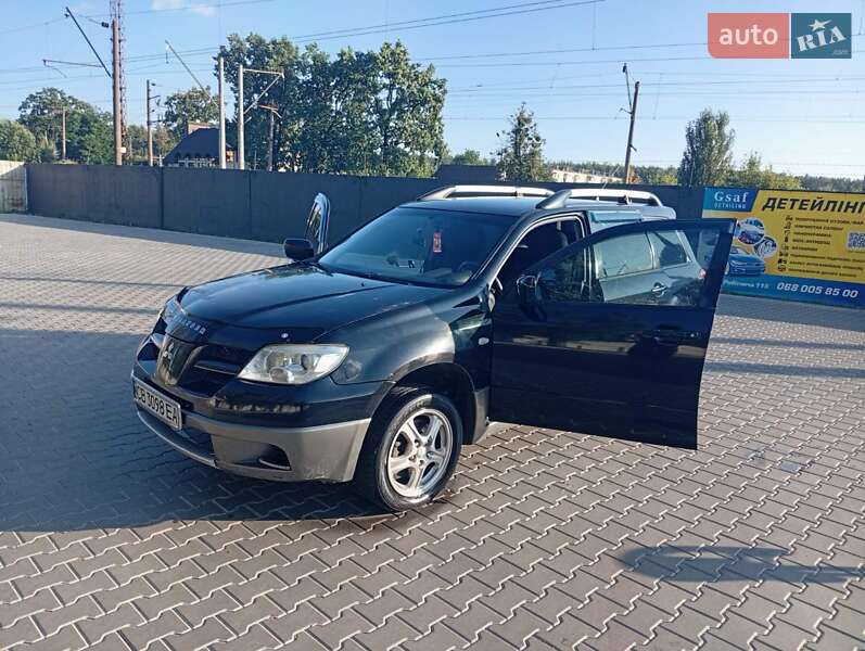 Внедорожник / Кроссовер Mitsubishi Outlander 2005 в Коцюбинском фото 2 Внедорожник / Кроссовер Mitsubishi Outlander 2005 в Коцюбинском