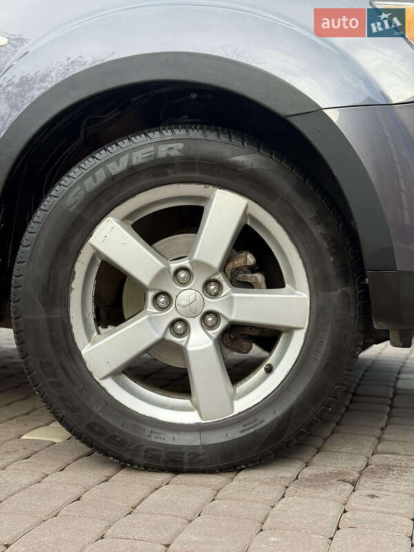 Внедорожник / Кроссовер Mitsubishi Outlander 2009 в Косове фото 27 Внедорожник / Кроссовер Mitsubishi Outlander 2009 в Косове