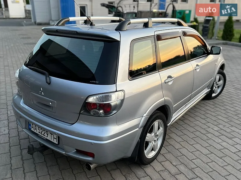 Mitsubishi Outlander 2006 VIN JMBXRCU5W7U000678 фото оголошення 9 з 153