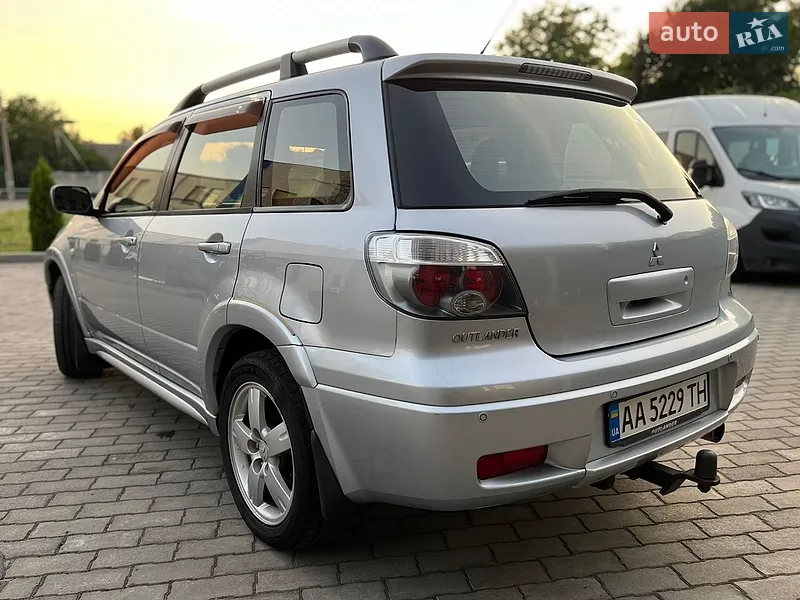 Mitsubishi Outlander 2006 VIN JMBXRCU5W7U000678 фото оголошення 11 з 153