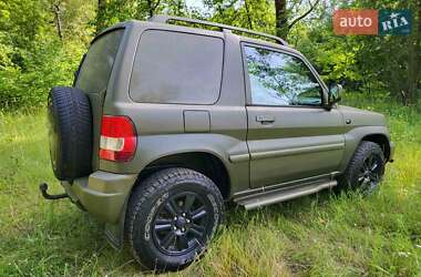 Внедорожник / Кроссовер Mitsubishi Pajero Pinin 1999 в 