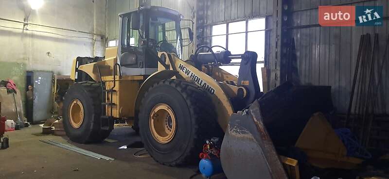 Фронтальный погрузчик New Holland 270 2006 в 