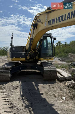 Екскаватор навантажувач New Holland E 305 2013 в Дніпрі