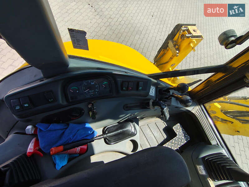 Екскаватор навантажувач New Holland LB95B-4PT 2003 в Львові