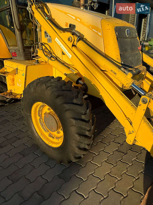 Екскаватор навантажувач New Holland LB95B-4PT 2003 в Львові