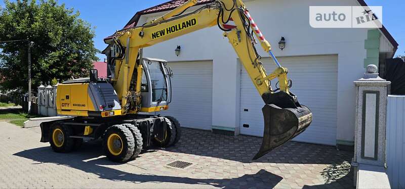 Колесный экскаватор New Holland MH 3.6 2009 в 