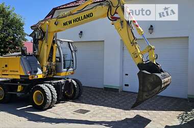 Колесный экскаватор New Holland MH 3.6 2009 в 
