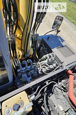Колесный экскаватор New Holland MH 3.6 2009 в 