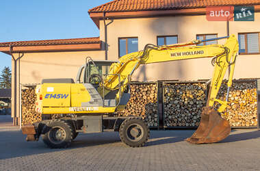 Колесный экскаватор New Holland MH 3.6 2003 в 