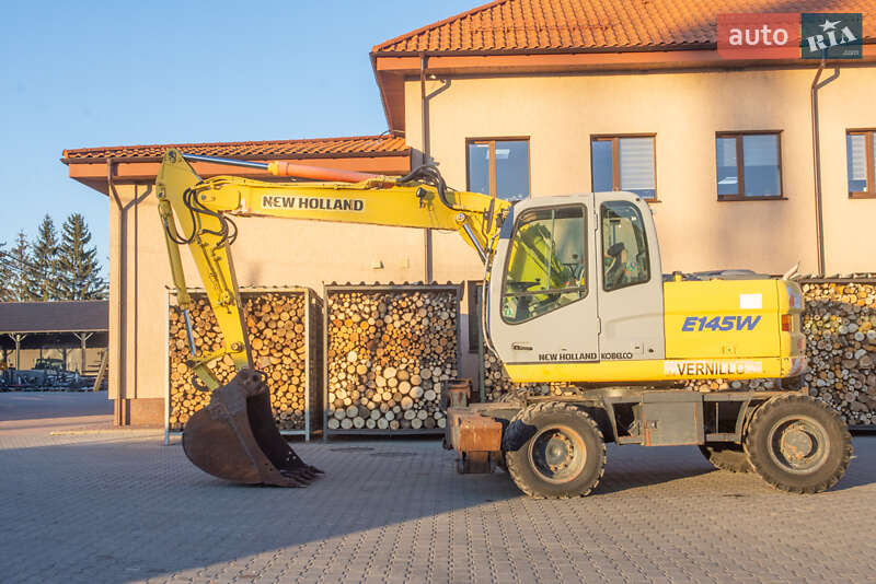 Колесный экскаватор New Holland MH 3.6 2003 в 