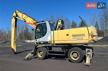 Колесный экскаватор New Holland MH 6.6 2005 в 