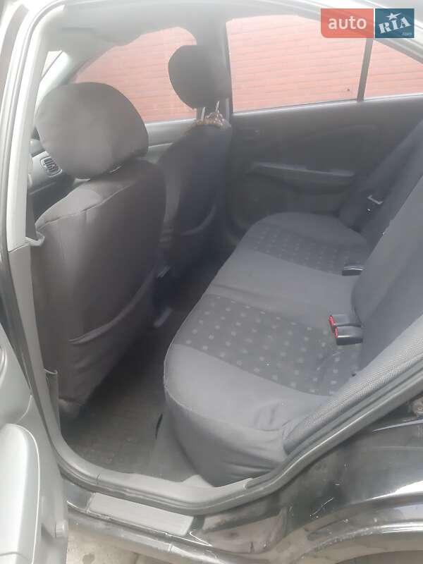 Седан Nissan Almera Classic 2010 в Охтирці
