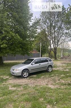 Хэтчбек Nissan Almera 1999 в 