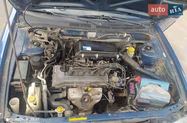 Хэтчбек Nissan Almera 1999 в 