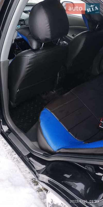 Седан Nissan Almera 2012 в Буче