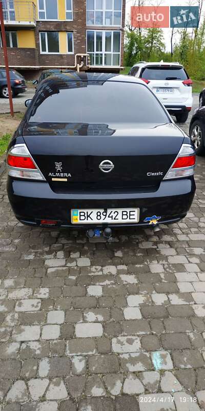 Седан Nissan Almera 2012 в Буче