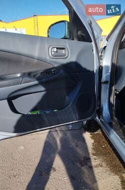 Хетчбек Nissan Almera 2006 в 