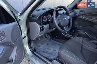 Седан Nissan Almera 2011 в 