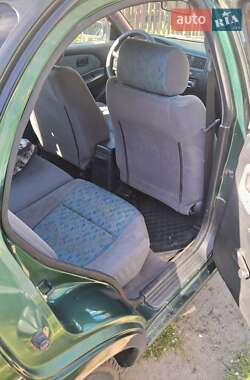 Хэтчбек Nissan Almera 1997 в 
