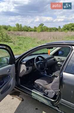 Хэтчбек Nissan Almera 2000 в 