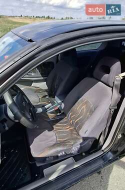 Хэтчбек Nissan Almera 2000 в 