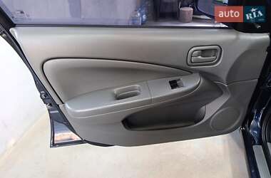 Седан Nissan Almera 2012 в 