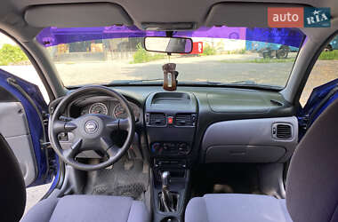 Седан Nissan Almera 2004 в 