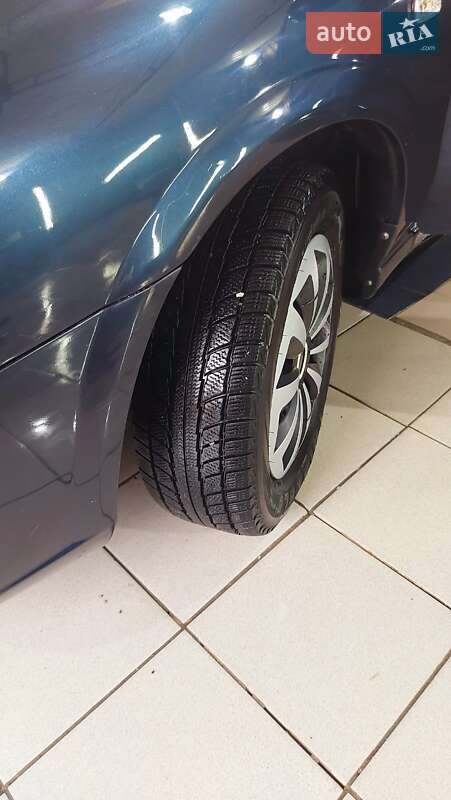 Седан Nissan Almera 2007 в Остер