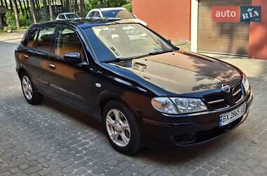 Хэтчбек Nissan Almera 2000 в 