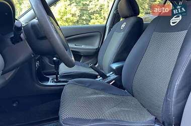 Седан Nissan Almera 2012 в 