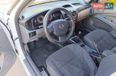 Седан Nissan Almera 2012 в 